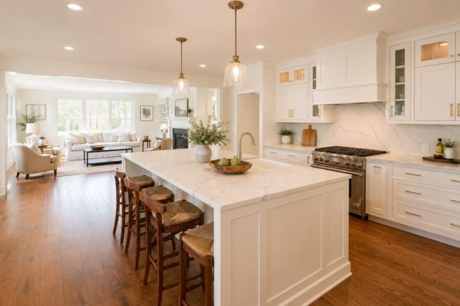 Open concept kitchen renovation in a Chester County PA Colonial home with white shaker cabinets and large island