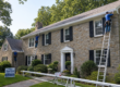 Seamless gutter installation on a stone Colonial home in Chester County PA