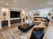 Professional basement finishing Chester County PA — finished family room with LVP flooring and recessed lighting