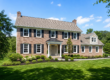 Window replacement Chester County PA — colonial home exterior with newly installed windows